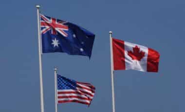 American, Australian and Canadian flags