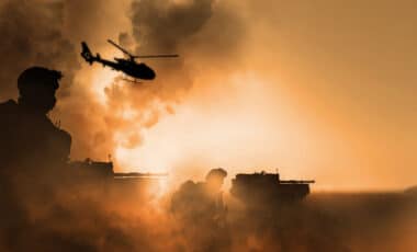 War, explosion and helicopter, silhouette of soldier on battlefield